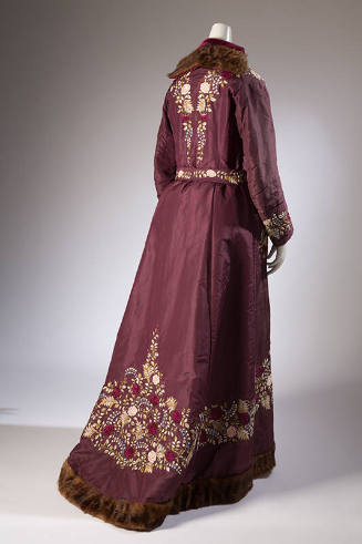 Back view of dark red dressing gown with ivory, gold, red and blue floral embroidery, slight tr…