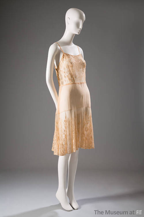 Beige slip with spaghetti straps, floral lace bodice and flounce knee length skirt