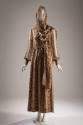 Ankle length dress in brown reptile print with long sleeves cinched at wrist and matching stole…