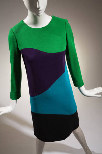 Long sleeve dress with serpentine horizontal panels in green, navy, turqoise, then black