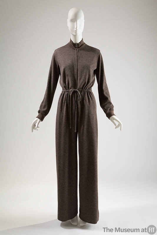 Long sleeve grey jumpsuit with band collar, drawstring waist and wide leg pants