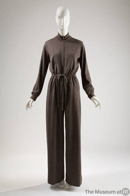 Long sleeve grey jumpsuit with band collar, drawstring waist and wide leg pants