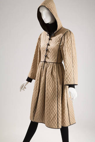 Beige diamond pattern quilted hooded coat with brown trim and button front bodice