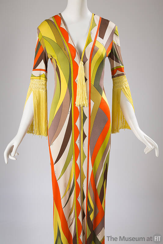 Yellow, orange, off-white, brown and green abstract print dress with yellow tassel at V-neck an…