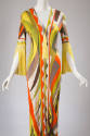 Yellow, orange, off-white, brown and green abstract print dress with yellow tassel at V-neck an…