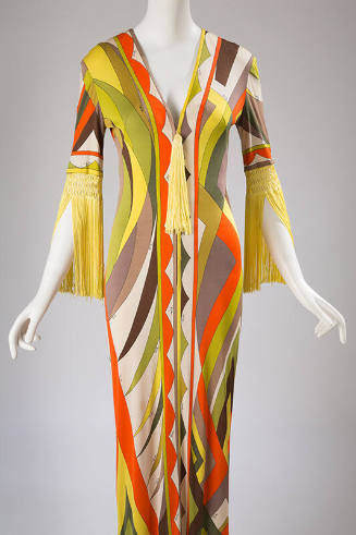 Yellow, orange, off-white, brown and green abstract print dress with yellow tassel at V-neck an…