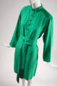 Green knee length dress with woven floral design, long sleeves, button front bodice and matchin…