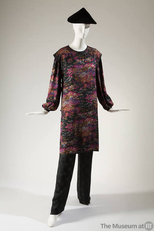 Long sleeve black dress printed with small abstract pattern in purple, gold and white, black si…