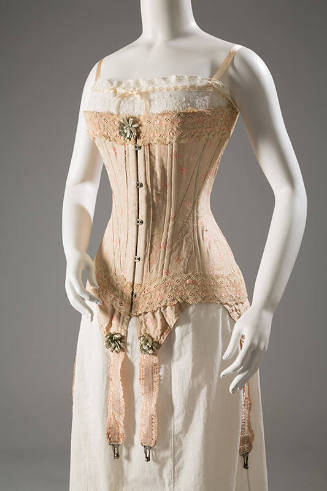 Pink and white floral brocade long corset with pink lace trim top and bottom, green rosettes ce…