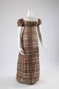 Red, green, blue, yellow, black and white floor length tartan print dress with high empire wais…