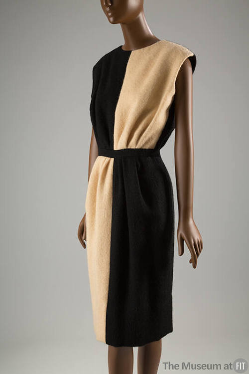 Black and cream sleeveless dress with straight skirt