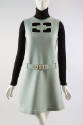 Aqua knee length dress with geometric cut out on chest & belt, styled with black longsleeve tur…