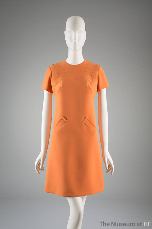 Orange wool short sleeveless dress; round neck with shoulder zipper opening either side; false …
