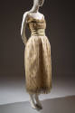 Cream net evening dress embroidered with yellow flowers, gilt sequins, and crystal beads