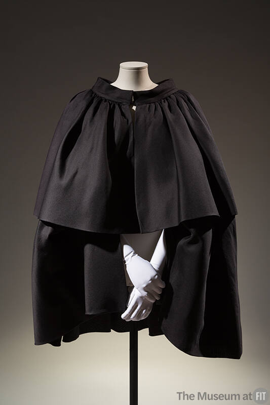 Black tiered cape; waist and knee length tiers