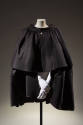 Black tiered cape; waist and knee length tiers