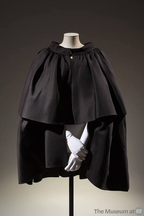 Black tiered cape; waist and knee length tiers