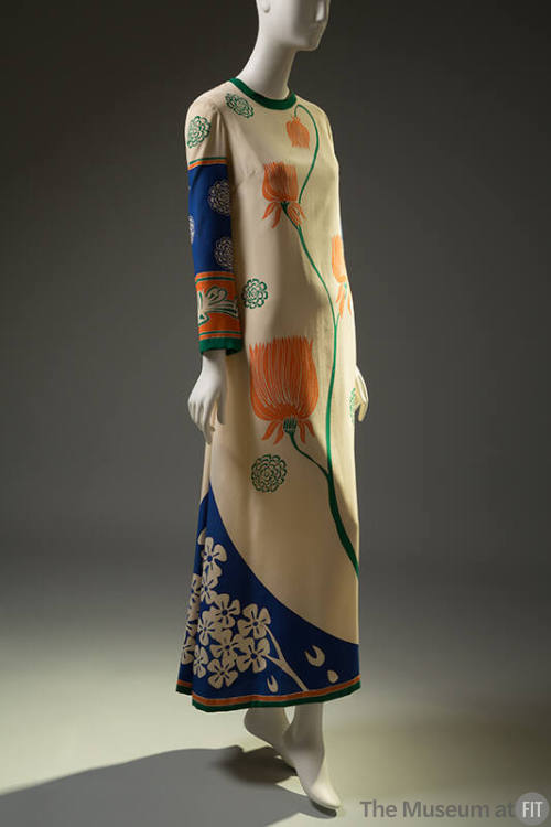 Off-white, blue and green long sleeve floor length dress with large orange floral motif