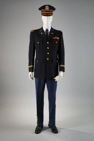 Man's U.S. Army Lt. Col. navy blue dress uniform: military hat with gold eagle, white gloves, s…