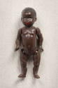 Black baby doll with articulated arms and legs
