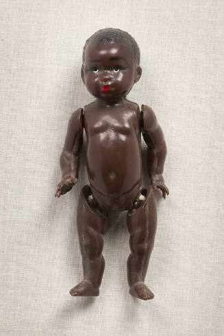 Black baby doll with articulated arms and legs