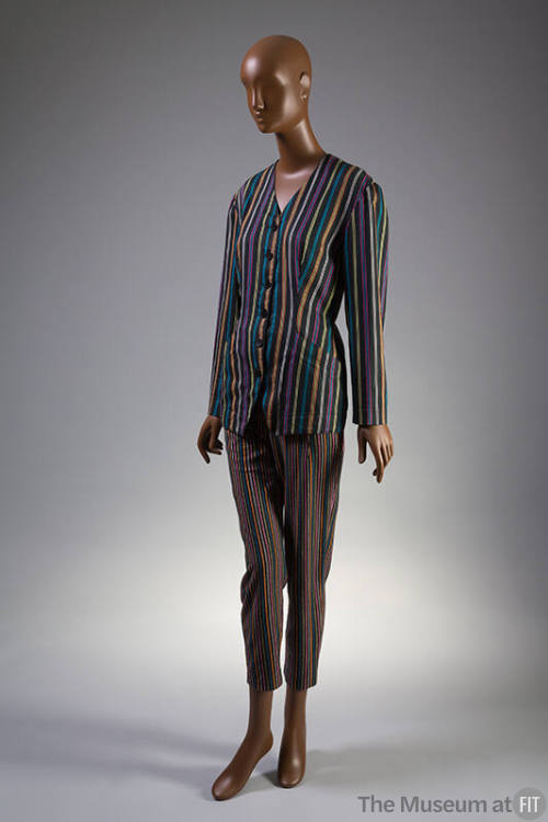 Hot pink, turquoise blue, orange, lime green, black, and white narrow striped pantsuit
