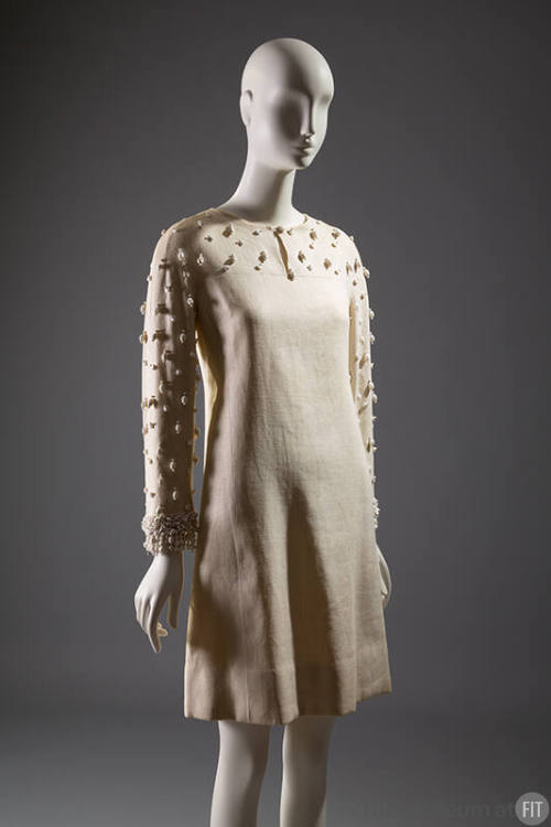 Beige linen long sleeve dress with white hand beaded dangling dots at sleeves