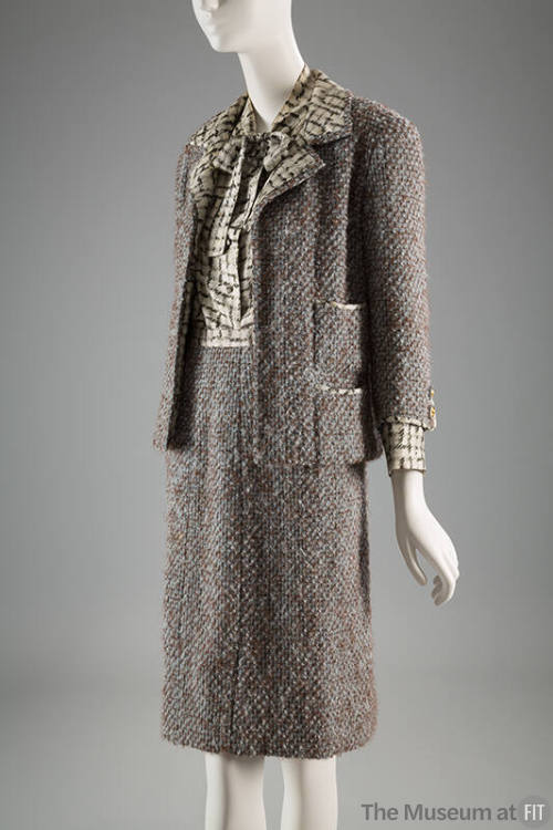 Pale blue and brown tweed jacket, skirt, and blouse suit set