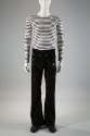 Man’s white and navy blue horizontal striped long sleeve top and black corduroy sailor style be…
