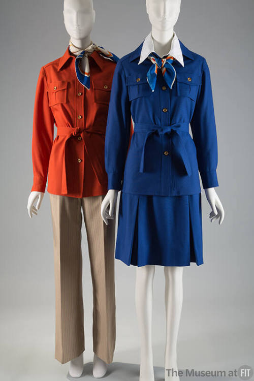 Orange shirt style uniform jacket with beige striped pants next to cobalt blue shirt style unif…