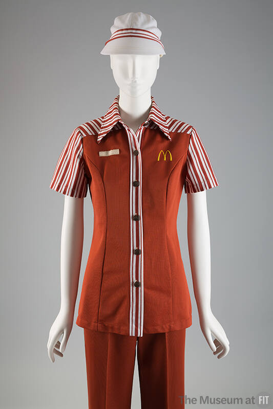 Brown McDonald’s uniform of short sleeve button front shirt with white striped trim, M logo on …