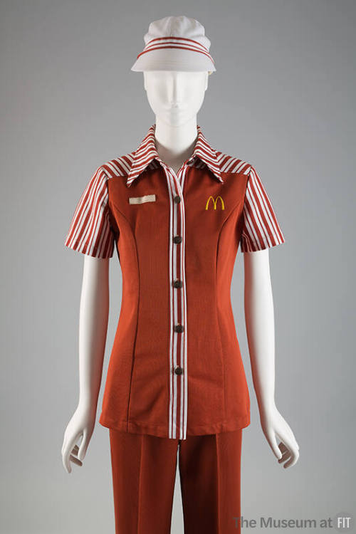 Brown McDonald’s uniform of short sleeve button front shirt with white striped trim, M logo on …