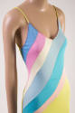 Detail view of slip dress bodice showing acid yellow straps, red stitching along top edge and d…
