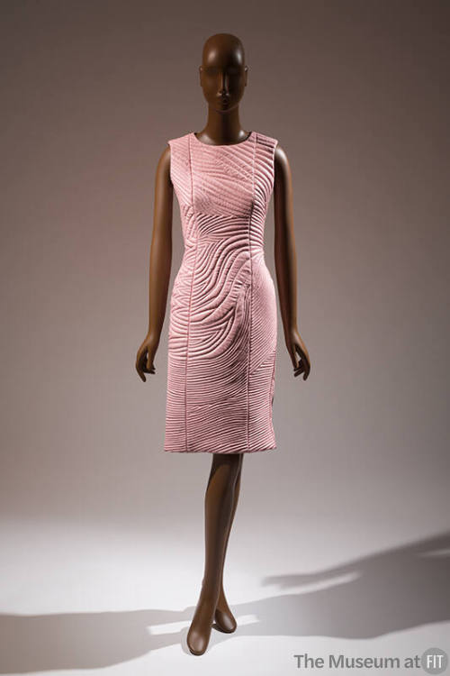 Pink sleeveless knee length dress with trapunto quilting throughout 