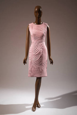Pink sleeveless knee length dress with trapunto quilting throughout 