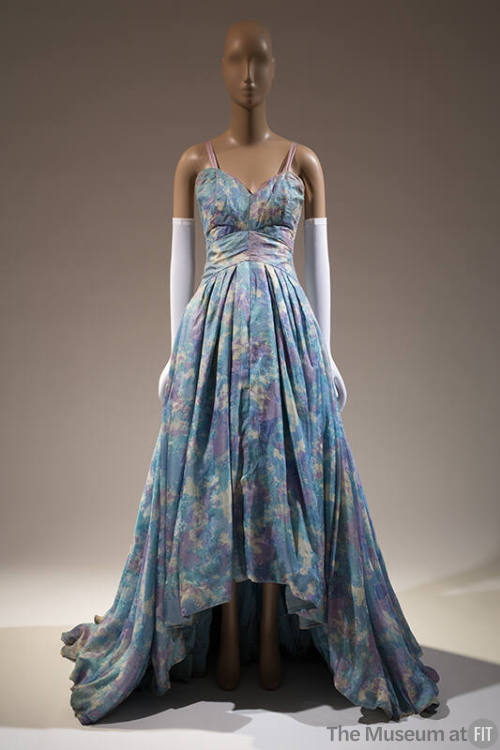 Blue, lavender and white printed sleeveless ball gown with sweetheart neckline, fitted bodice, …