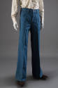 Blue denim flare leg jeans with zip and button front, belt loops 