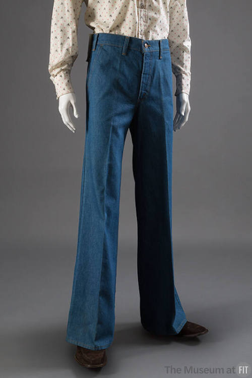 Blue denim flare leg jeans with zip and button front, belt loops 