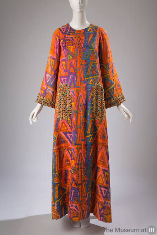 Caftan with abstract geometric print in orange, purple, pink, blue and yellow,  beaded trim