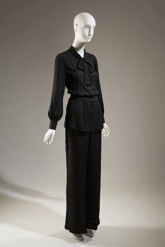 Black blouse with tied bow at neckline and matching pants
