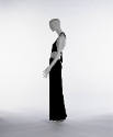 Side view of black halter jumpsuit with side cutouts
