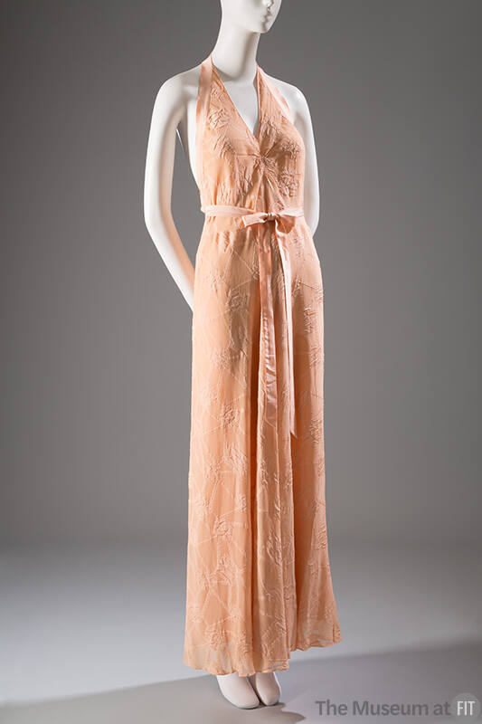 Pale orange halter nightgown with peach satin waist tie
