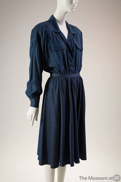 Dark blue denim shirt style bodysuit with long sleeves and flared skirt 