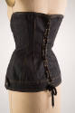 Back of blue denim corset with lacing 