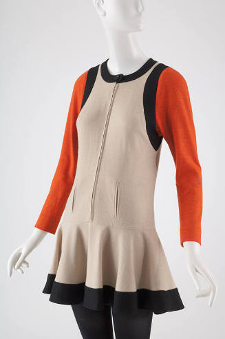 Ivory mini dress with black hem band and orange long sleeves