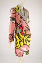 Suit jacet and skirt in blown up comic strip print of woman's face in red, neon, yellow, black,…