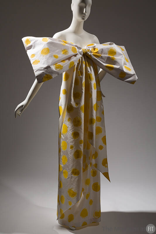 Floor length strapless white dress with bright yellow swirling circles with detachable, oversiz…