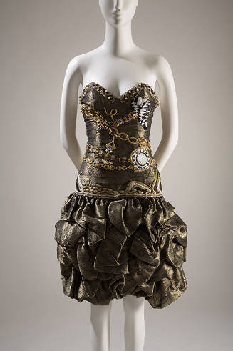 Black and tarnished metallic gold strapless evening dress with floral and geometric horizontal …