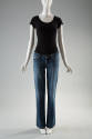 Dark blue denim distressed bootcut jeans dressed with black short sleeve t-shirt