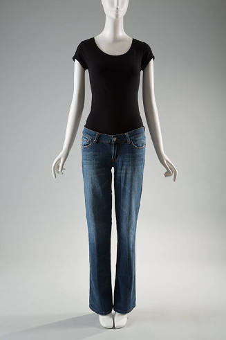 Dark blue denim distressed bootcut jeans dressed with black short sleeve t-shirt
